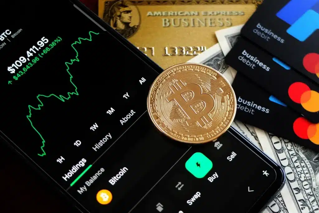 Application mobile de trading et gestion de portefeuille crypto avec graphiques et symboles de tokens